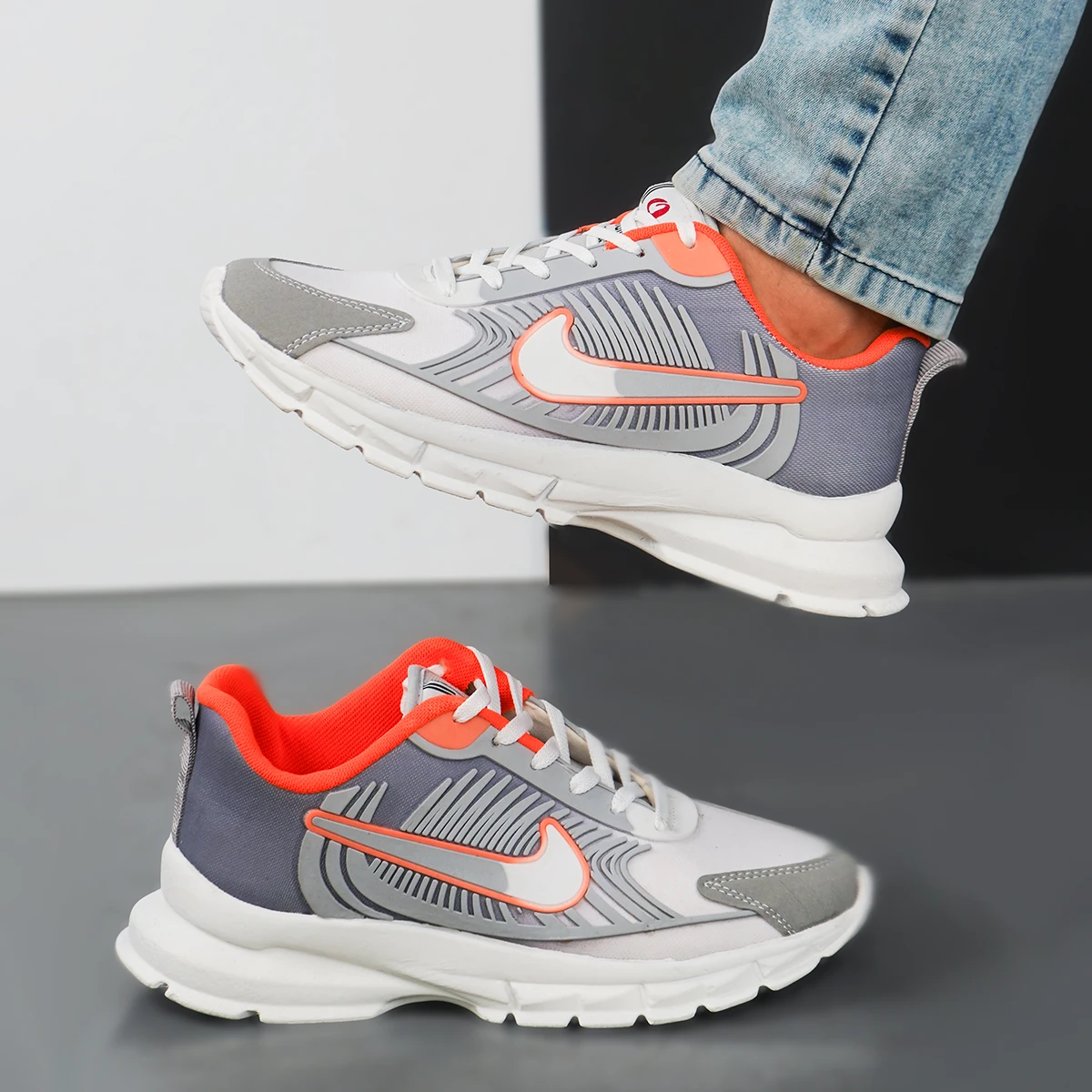 کفش ورزشی مردانه نایک طوسی نارنجی مدل مدل Farhan