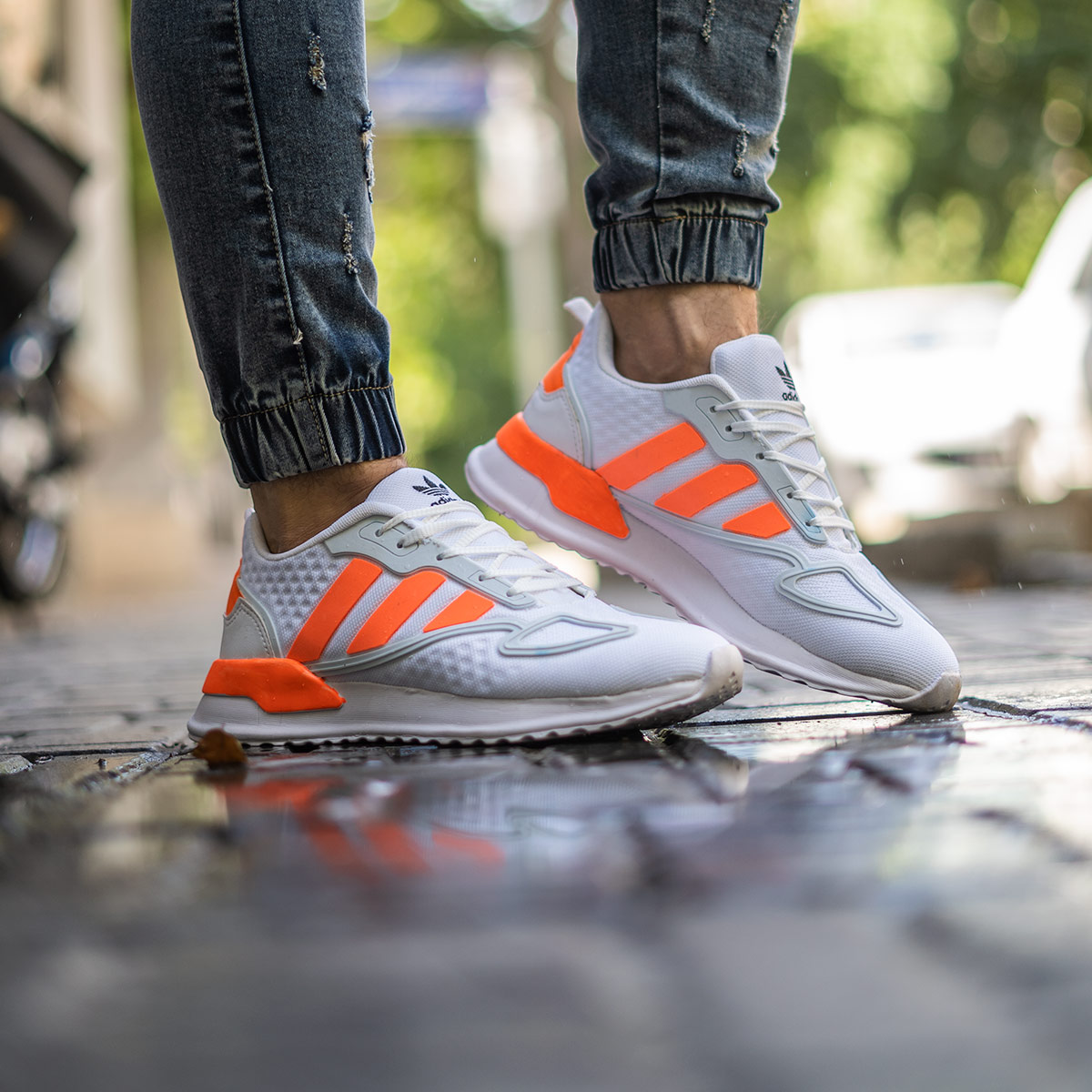 کفش ورزشی Adidas مردانه سفید نارنجی مدلSiban