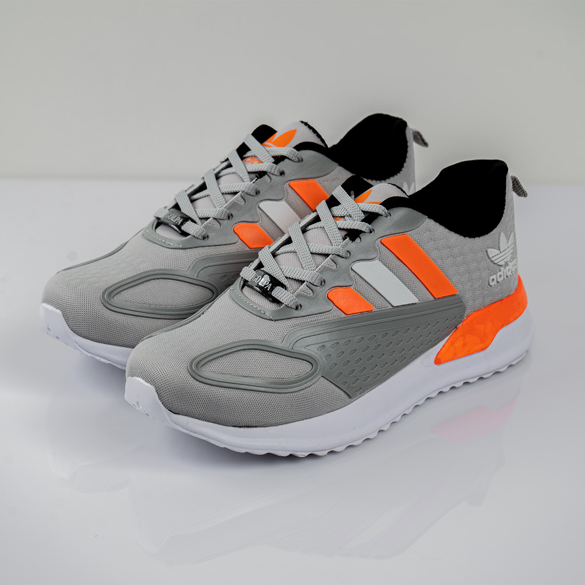 کفش ورزشی Adidas مردانه طوسی نارنجی مدل Tilda