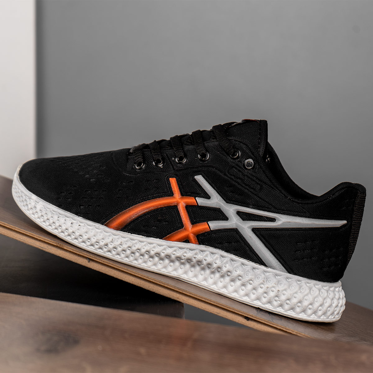 کفش ورزشی Asics مردانه مشکی نارنجی مدل Nardin(T)